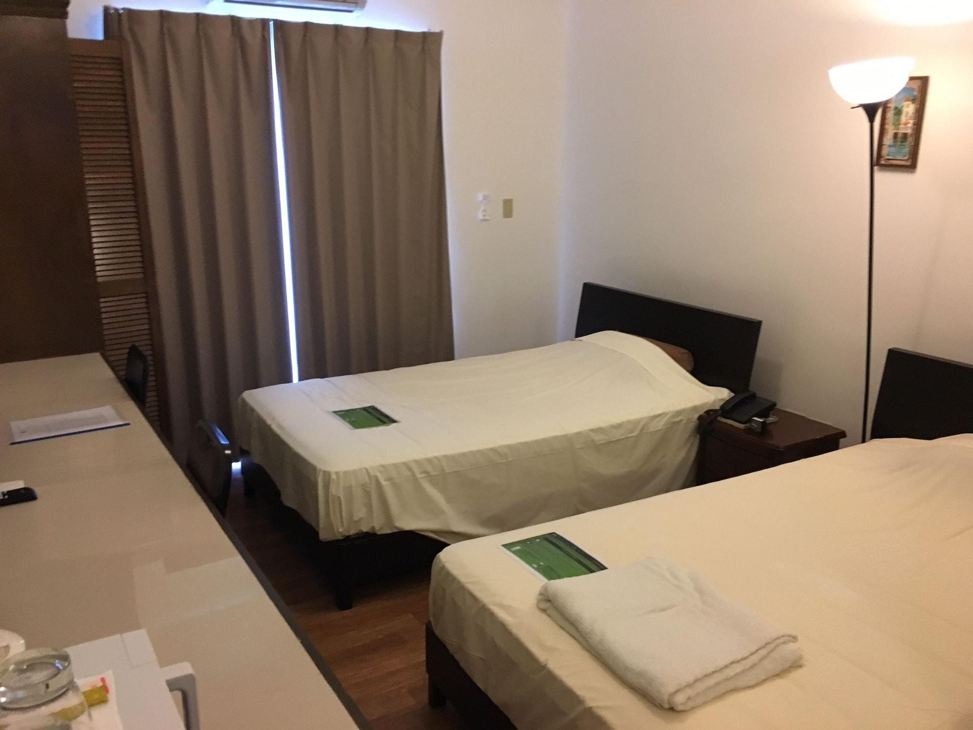 Himawari Hotel Garapan Exterior photo