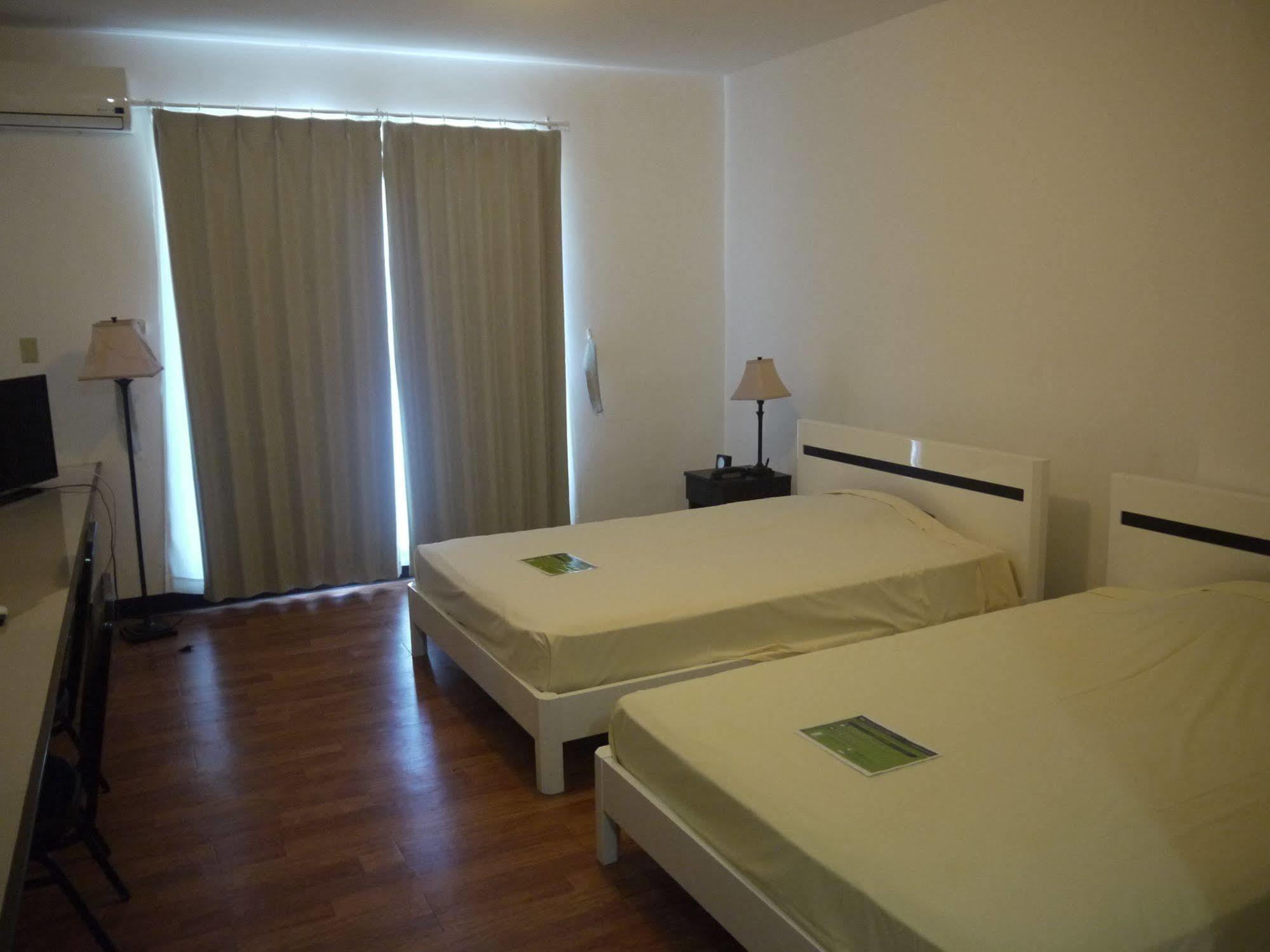 Himawari Hotel Garapan Exterior photo